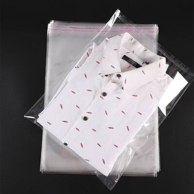 Wholesale custom transparent self-sealing adhesive Opp plastic bags for candies, clothing, books and notebooks