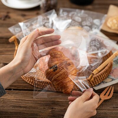 Disposable bread self-sealing bags, transparent food-grade plastic self-adhesive bread and biscuit baking packaging food bags.
